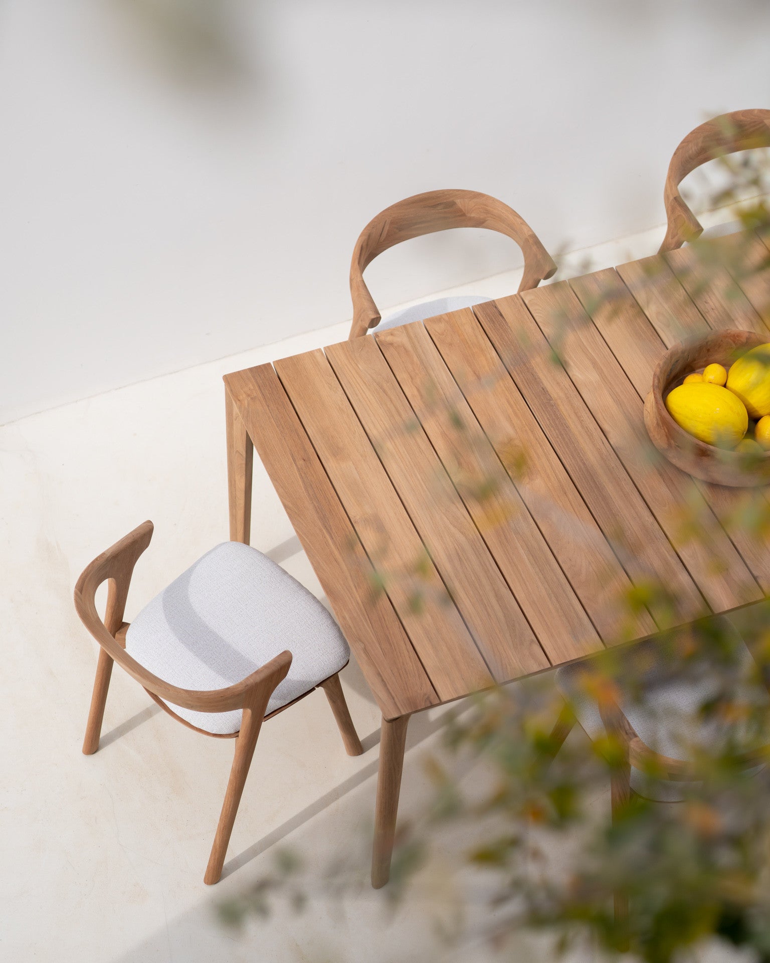 Bok Outdoor Dining Table, Teak 64" Lifestyle