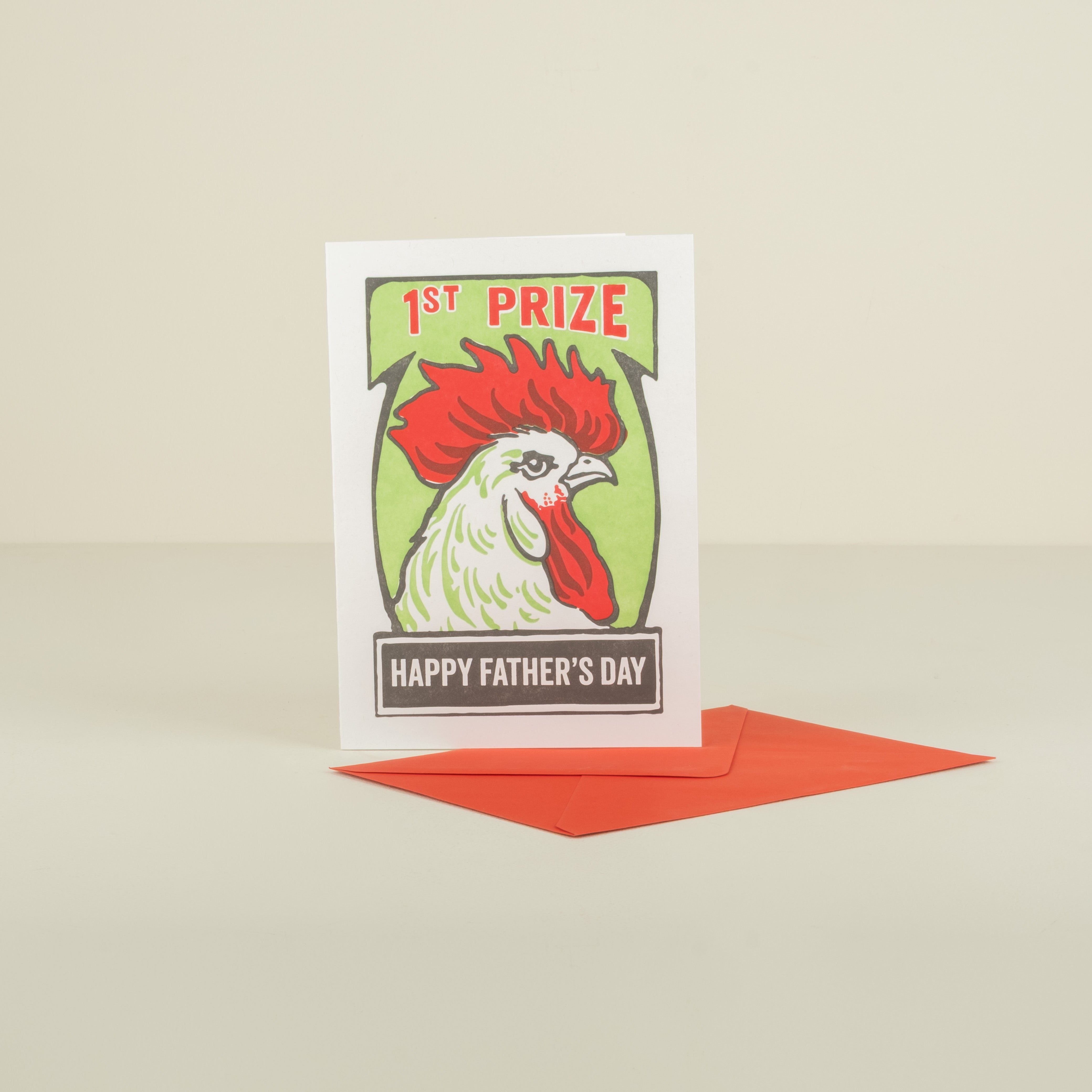 Father's Day card with rooster illustration and '1st Prize' text on a beige background