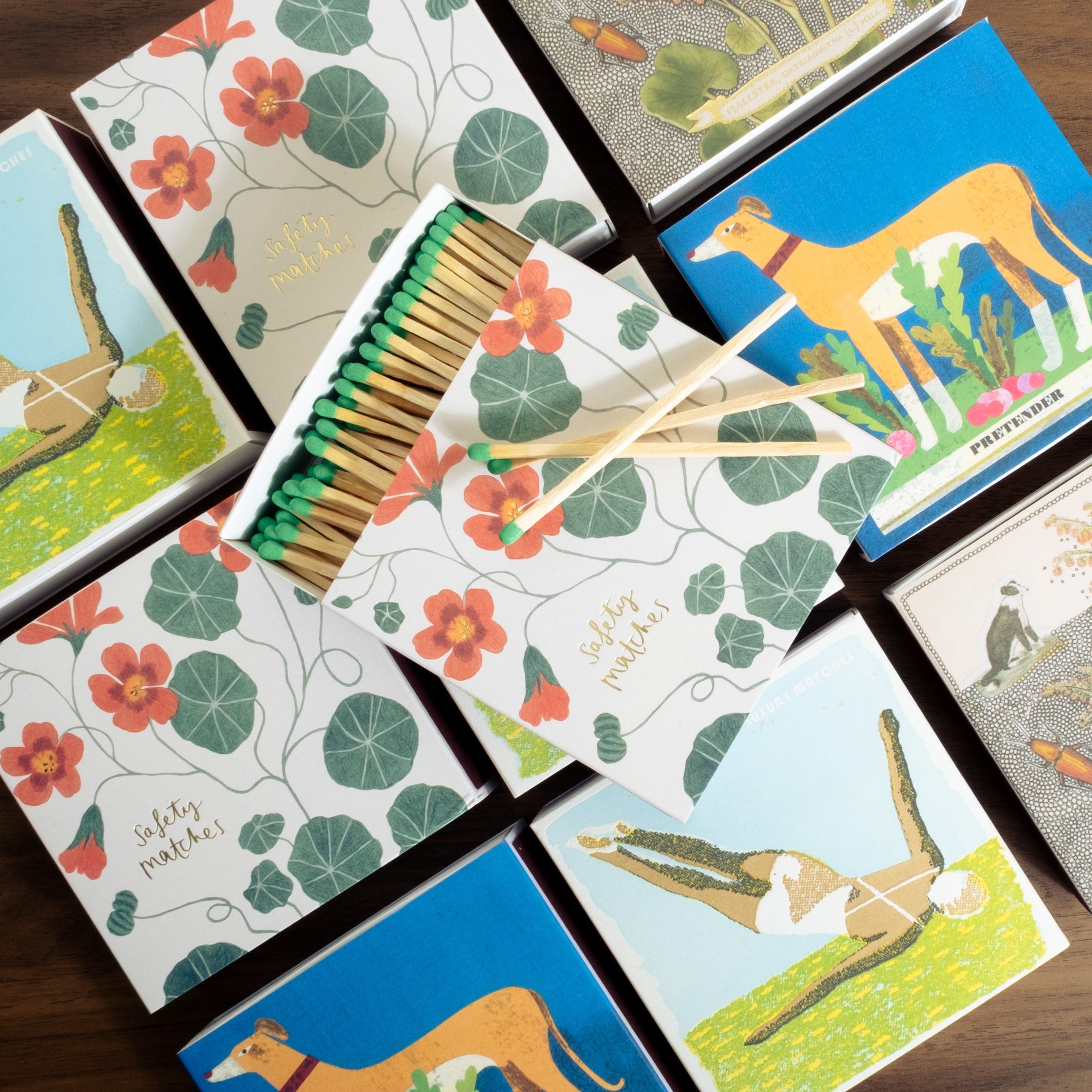 Set of animal-themed coasters on a wooden surface