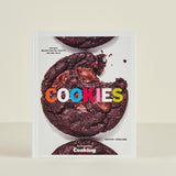 Book cover of 'Cookies' with a chocolate cookie and colorful text on a beige background