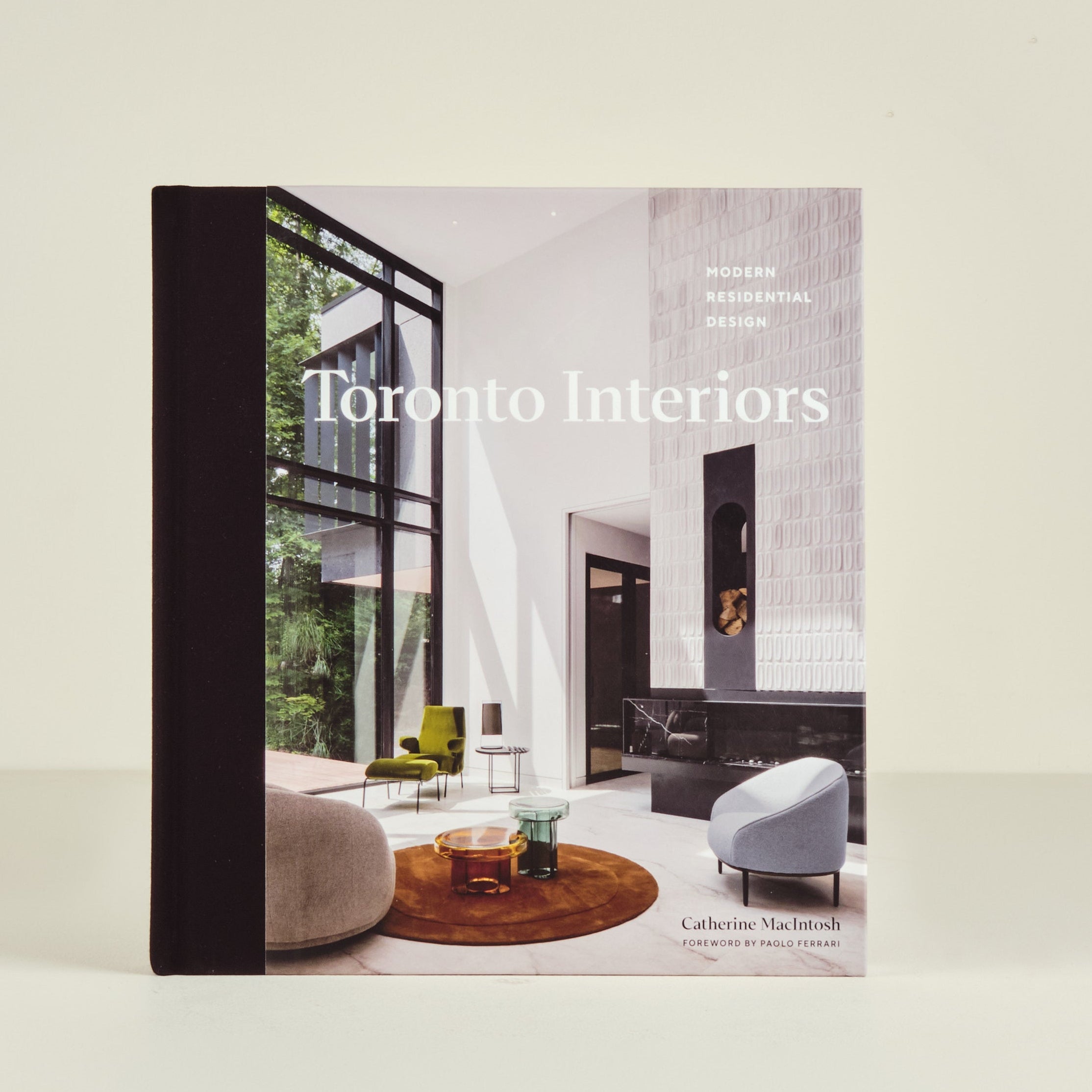 Book titled 'Toronto Interiors' with a modern interior design on the cover.