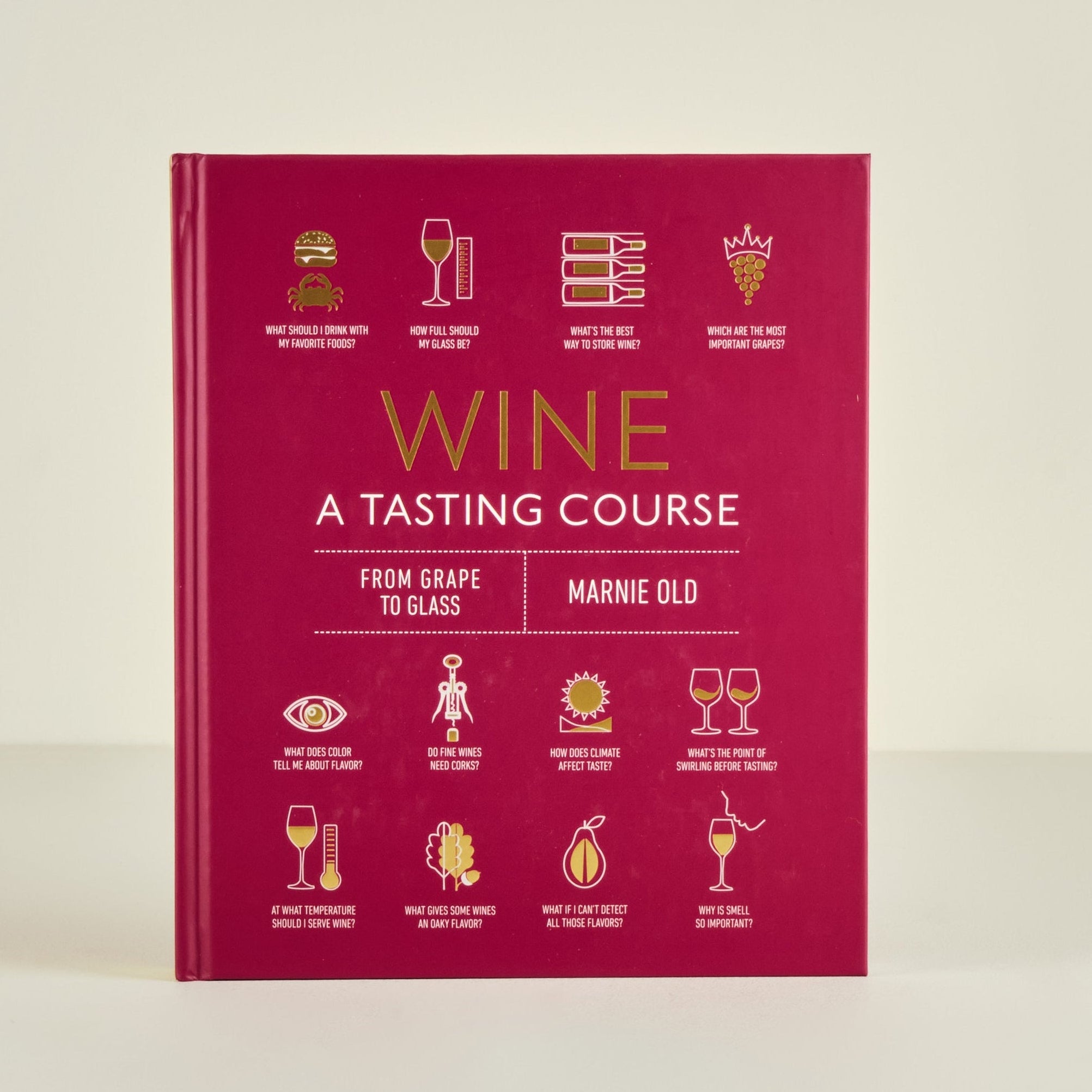 Red book titled 'Wine: A Tasting Course' with icons on a beige background