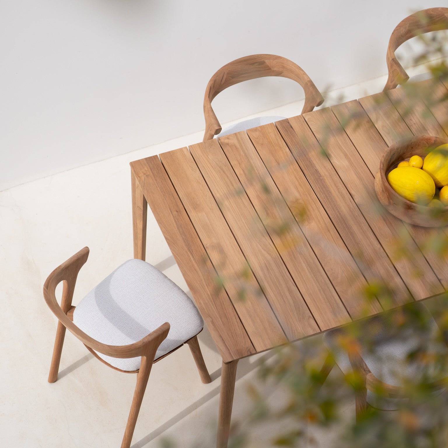 Bok Outdoor Dining Table, Teak 64" Lifestyle