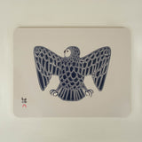 blue owl on beige background