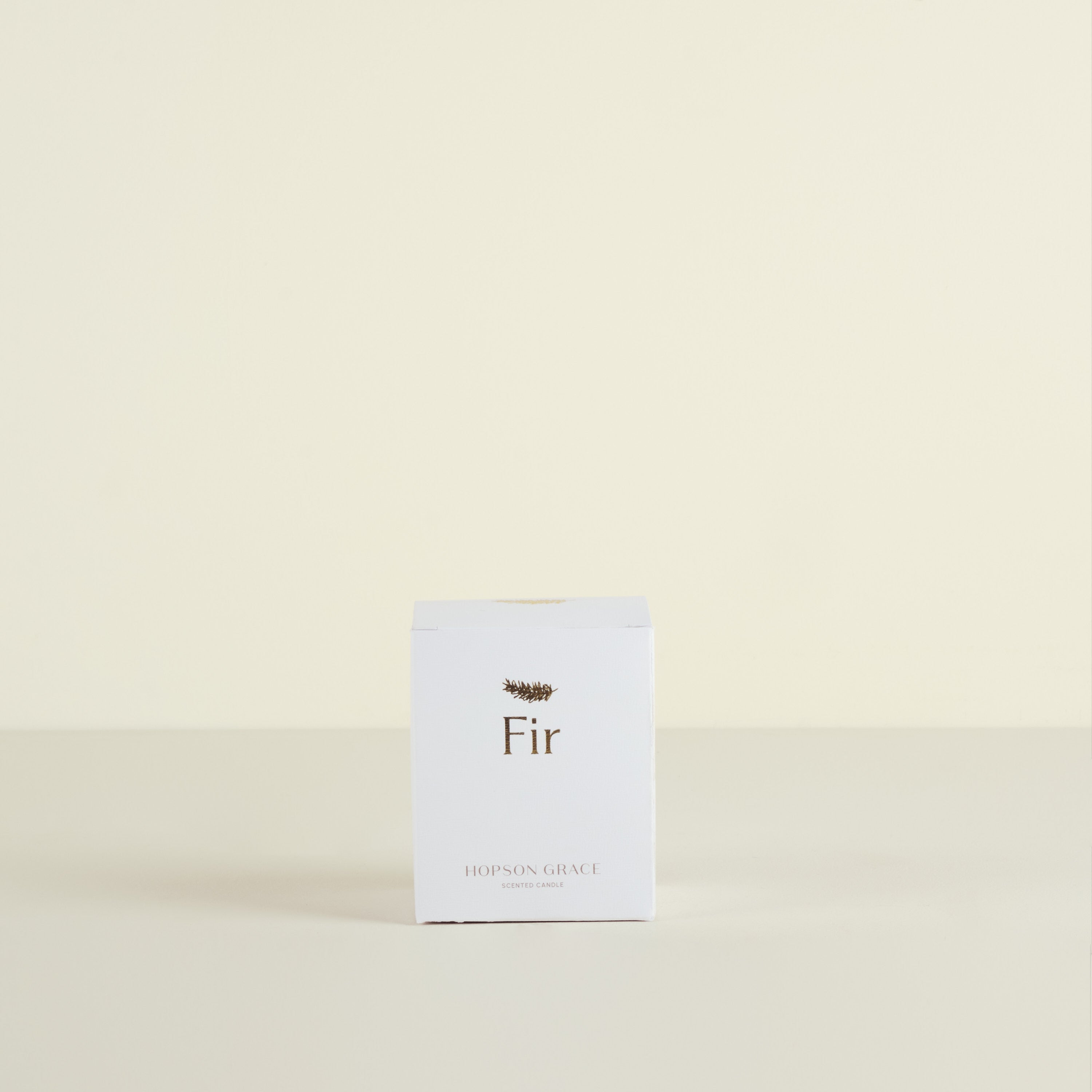Product packaging labeled 'Fir' on a beige background