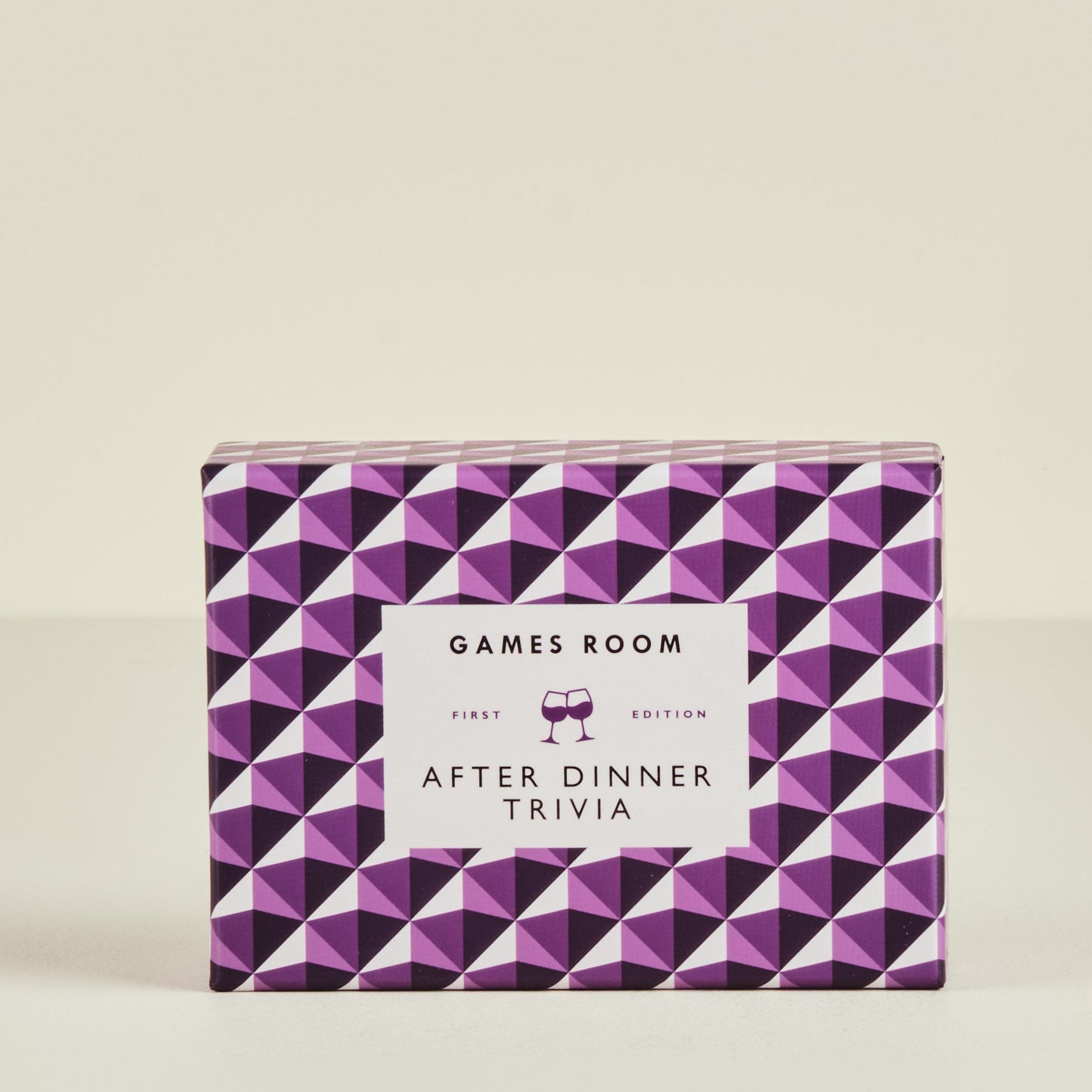 Purple and white geometric patterned book titled 'After Dinner Trivia' by 'Games Room'.