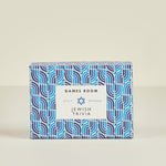 Box of 'Jewish Trivia' game on a beige background