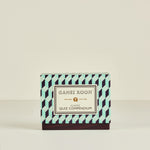 Box labeled 'Games Room Classic Quiz Compendium' with geometric pattern on a beige background