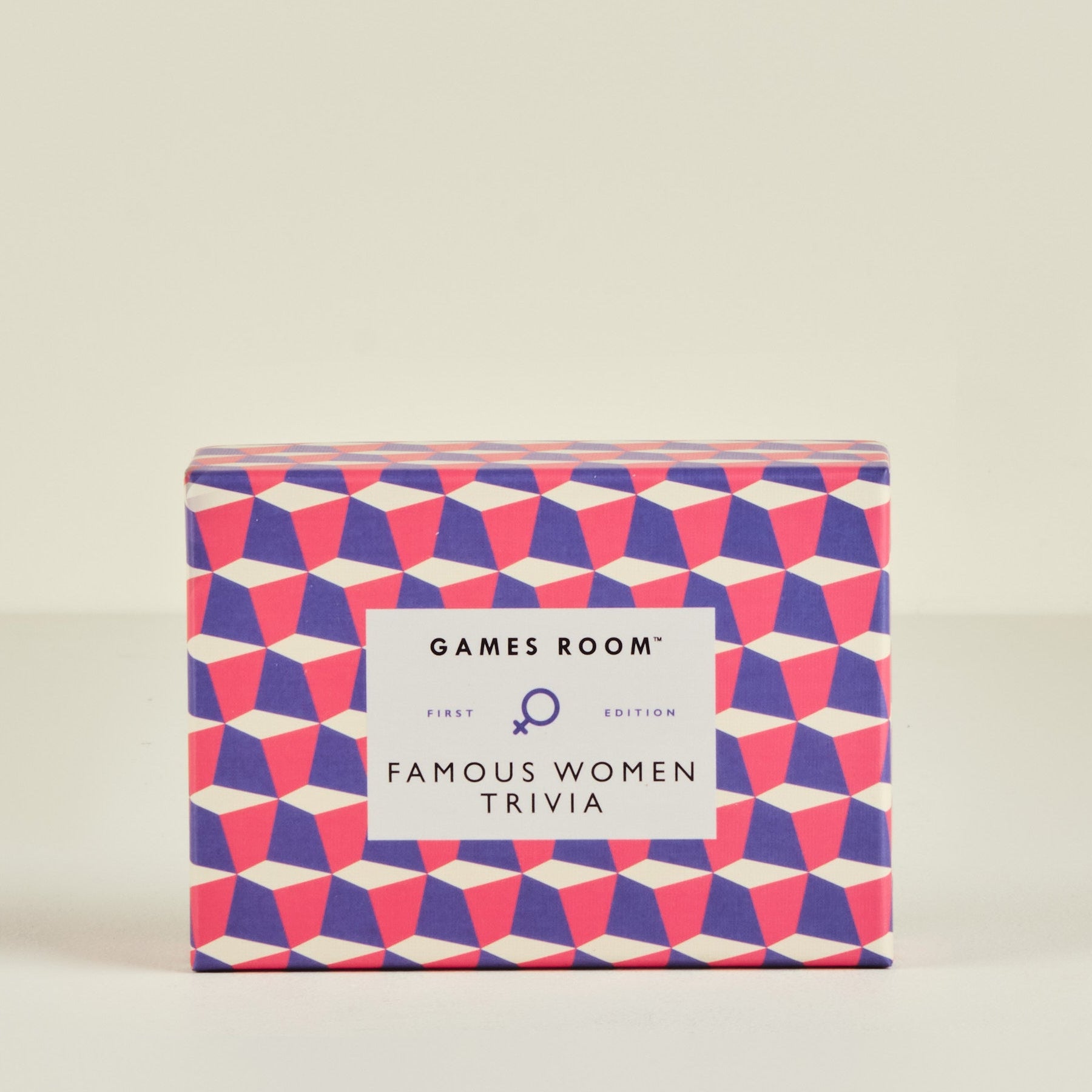 Box of 'Famous Women Trivia' game from Games Room on a beige background