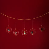 Decorative hanging ornaments on a red background