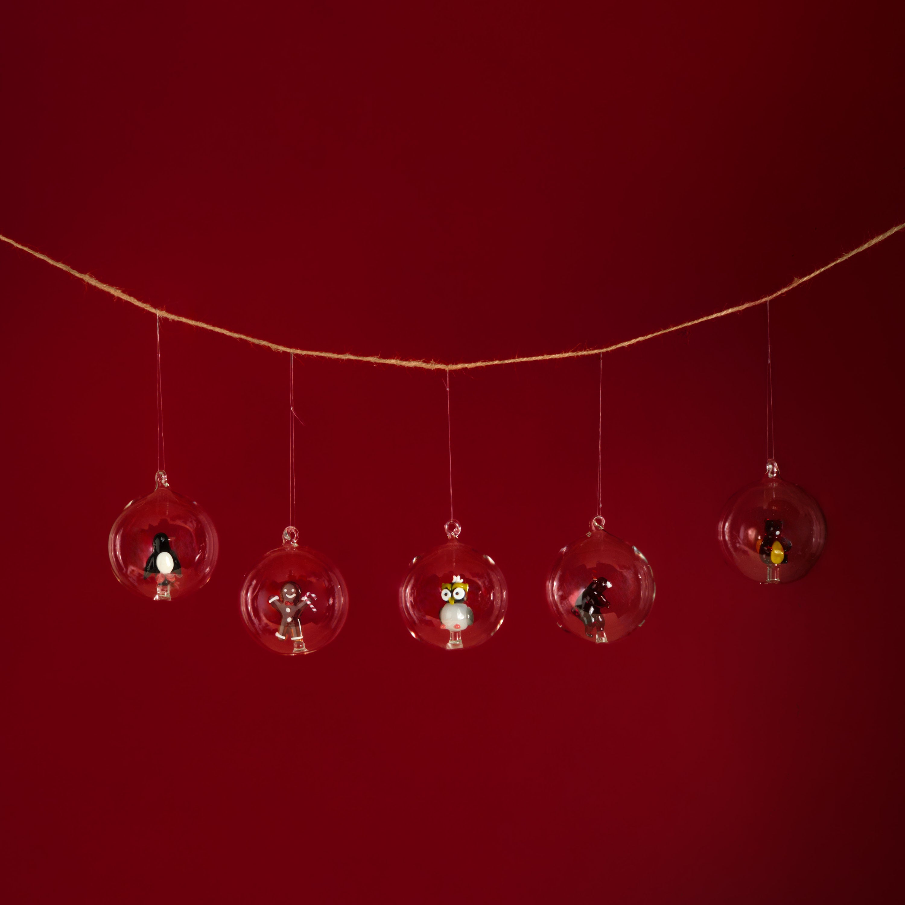 Decorative hanging ornaments on a red background