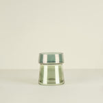 Clear glass vase on a beige background