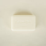 Bar of soap with 'Lothantique' branding on a beige background