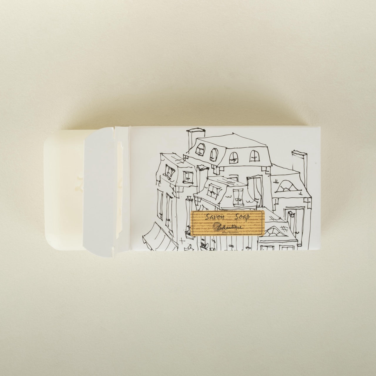 Soap and box on a beige background