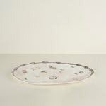 Decorative plate with floral patterns on a beige background
