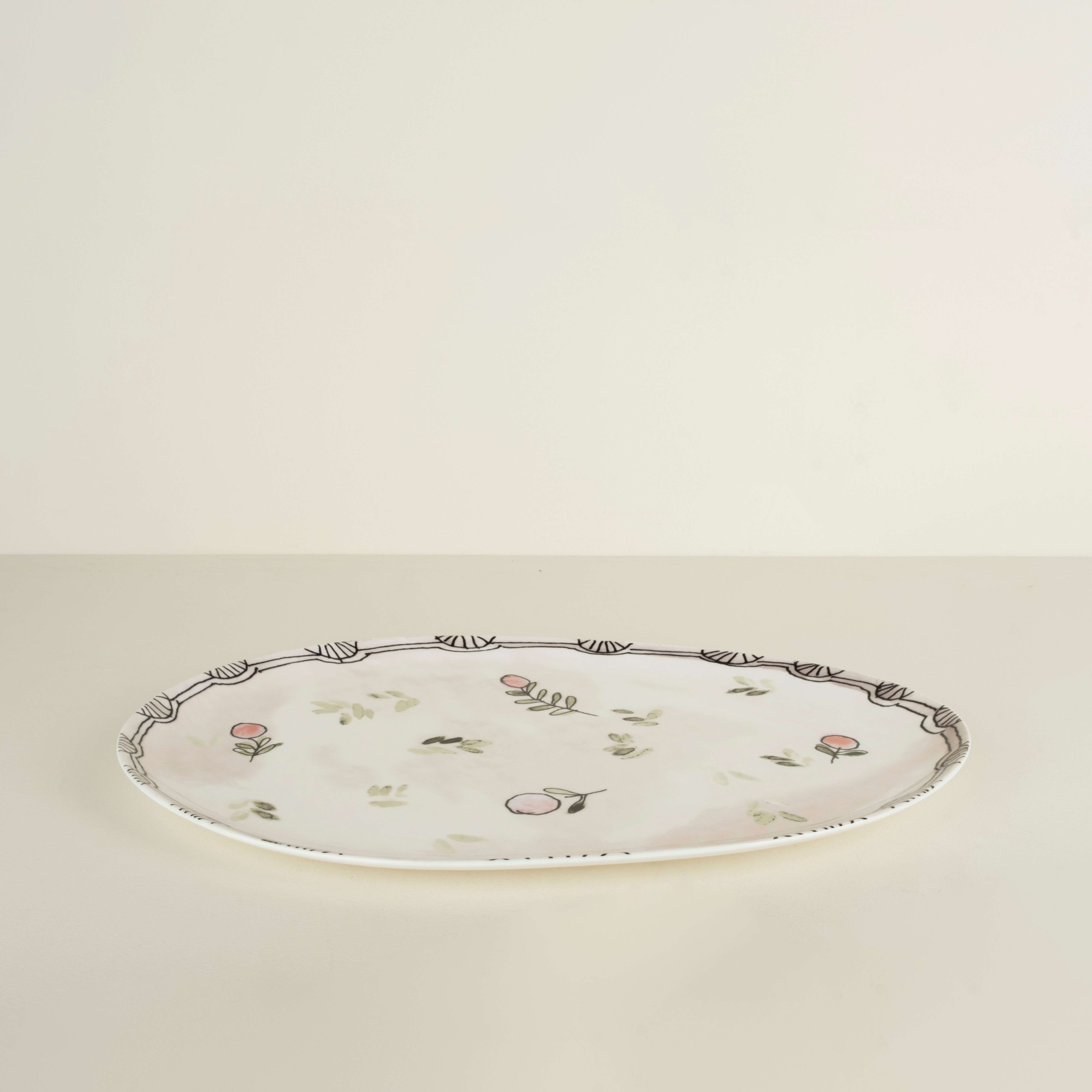 Decorative plate with floral patterns on a beige background
