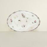Decorative plate with floral patterns on a beige background