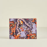 Small rectangular card with a colorful pattern on a beige background