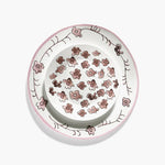 Decorative ceramic plate with floral pattern on a white background