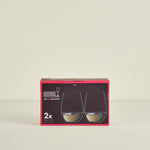 Box of Riedel wine glasses on a beige background