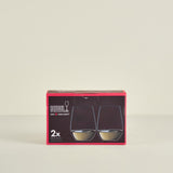 Box of Riedel wine glasses on a beige background